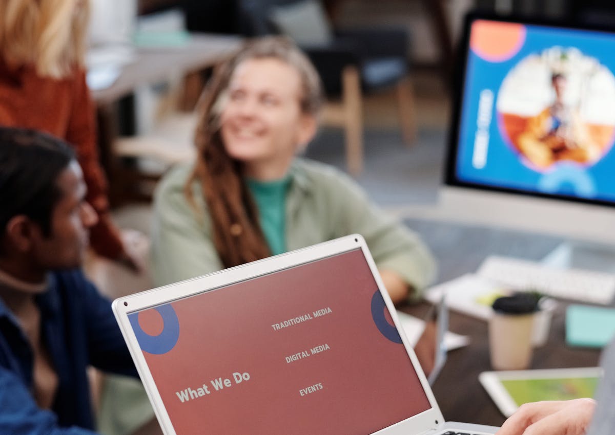 A team reviewing digital marketing campaign material